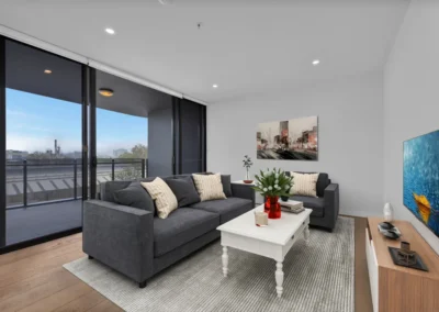 Modern, professionally furnished living room showing the benefits of virtual staging for real estate listings.