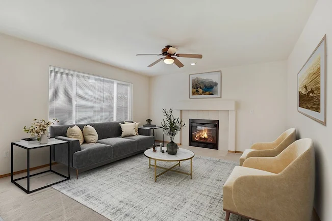 Digitally staged living room with a fireplace, designed to showcase interior potential for listings.