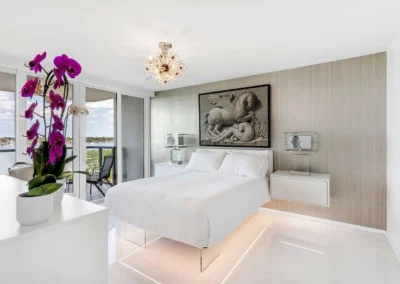 Contemporary bedroom with professional HDR lighting correction to highlight textures and interior design.