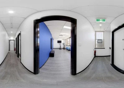 Professional 360 panorama of a commercial gym corridor with clean lines and expert seam stitching.