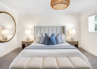 Luxury bedroom interior with soft, balanced lighting, shadow removal, and a warm, inviting atmosphere.