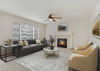 Digitally staged living room with a fireplace, designed to showcase interior potential for listings.